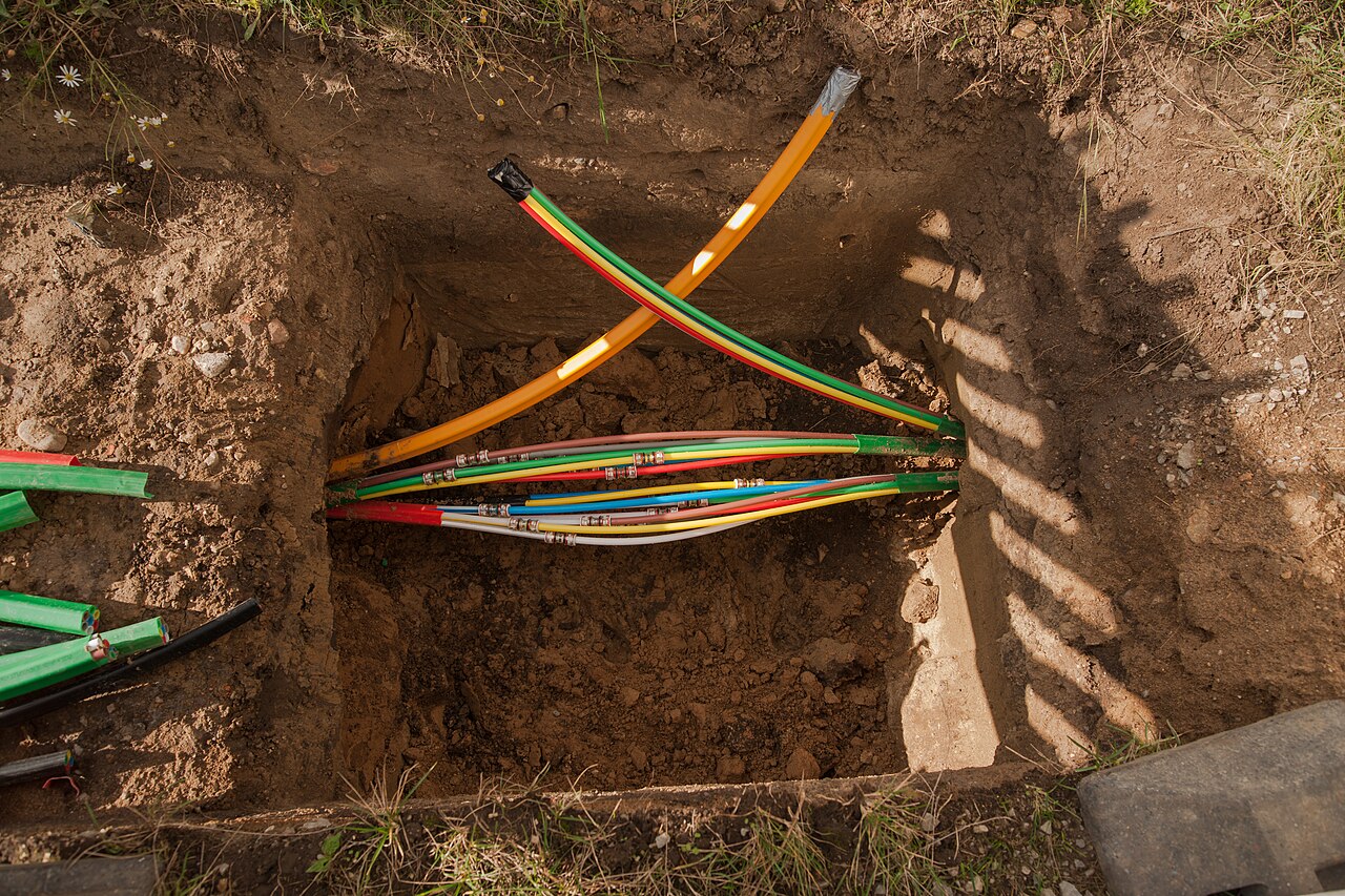 Underground utility lines in an excavated pit